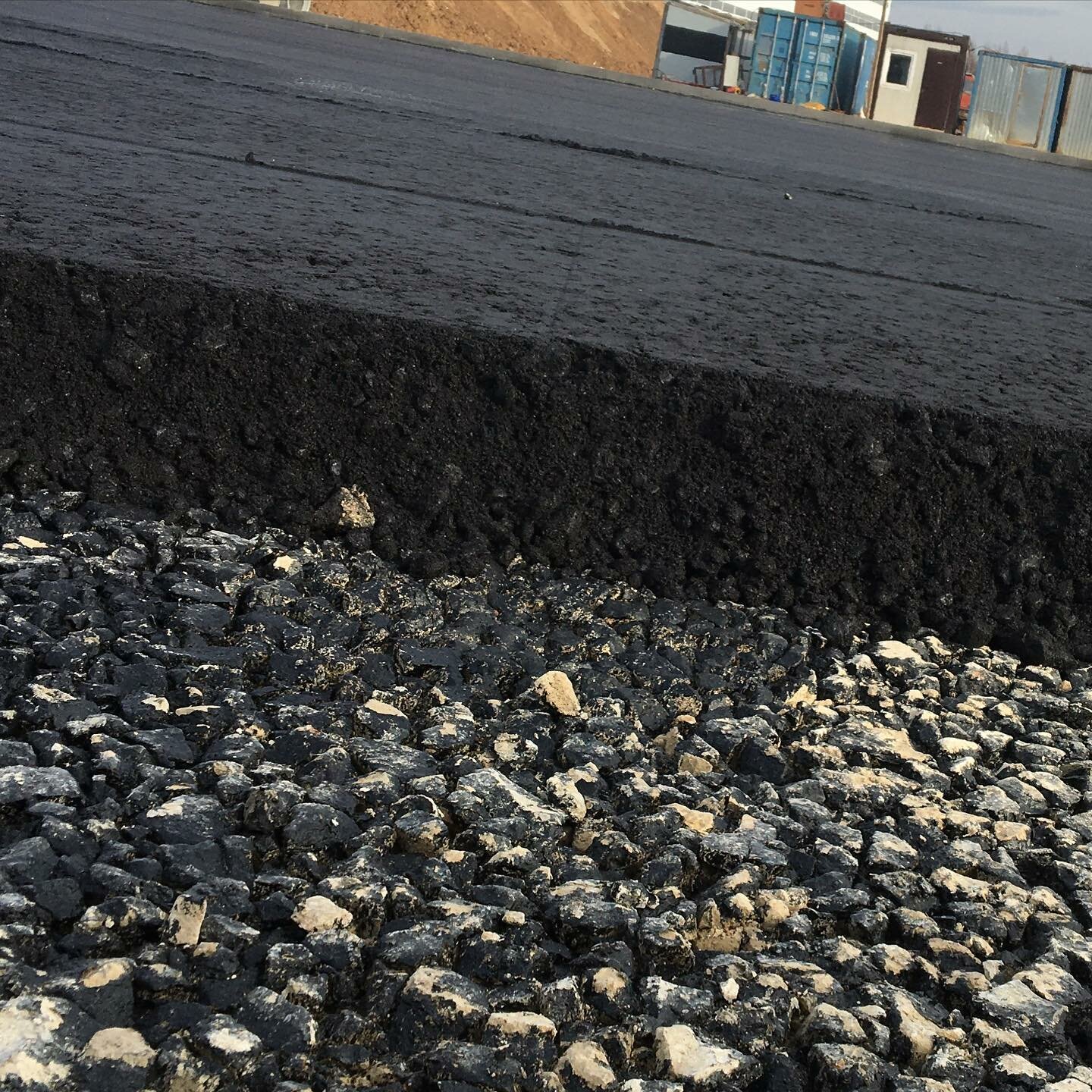 Устройство дорожного покрытия из мелкозернистого асфальтобетона