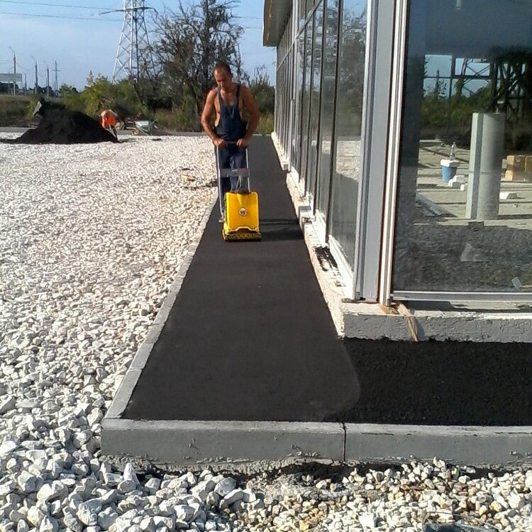 Устройство дорожного покрытия из мелкозернистого асфальтобетона