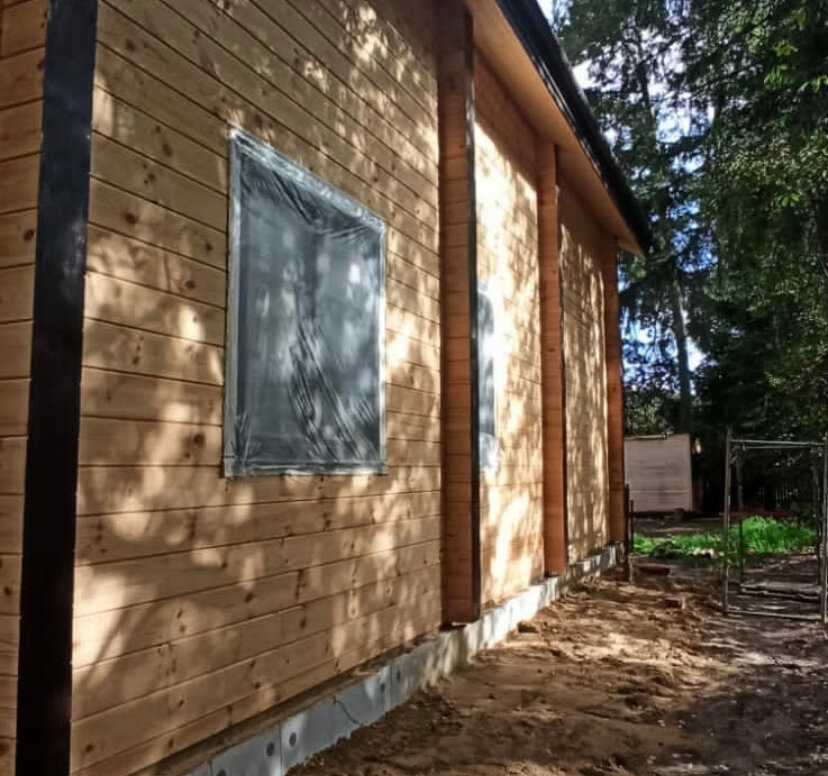 Покраска деревянного дома