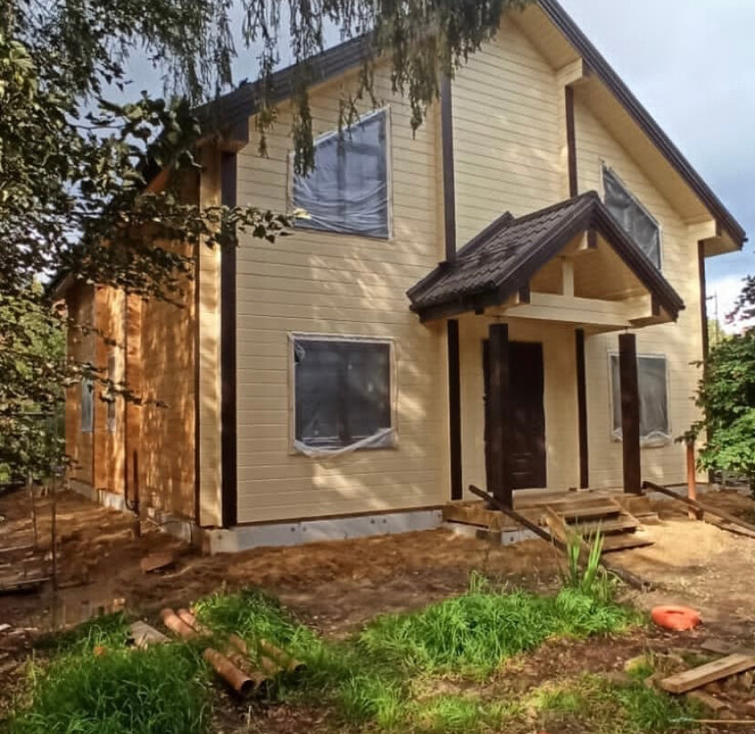 Покраска деревянного дома