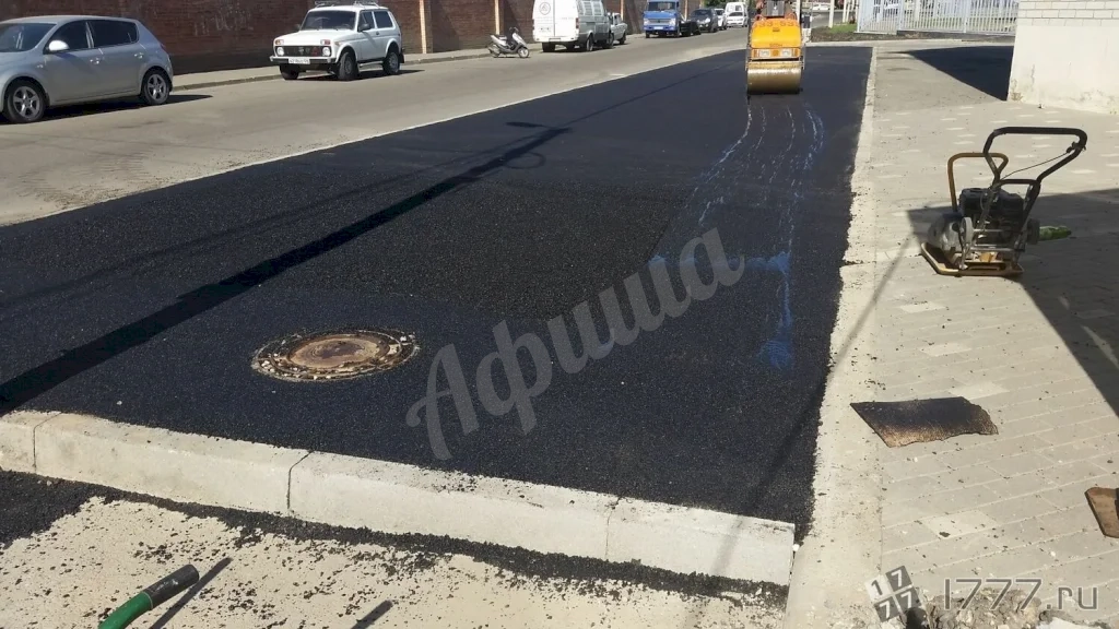 Устройство дорожного покрытия из мелкозернистого асфальтобетона