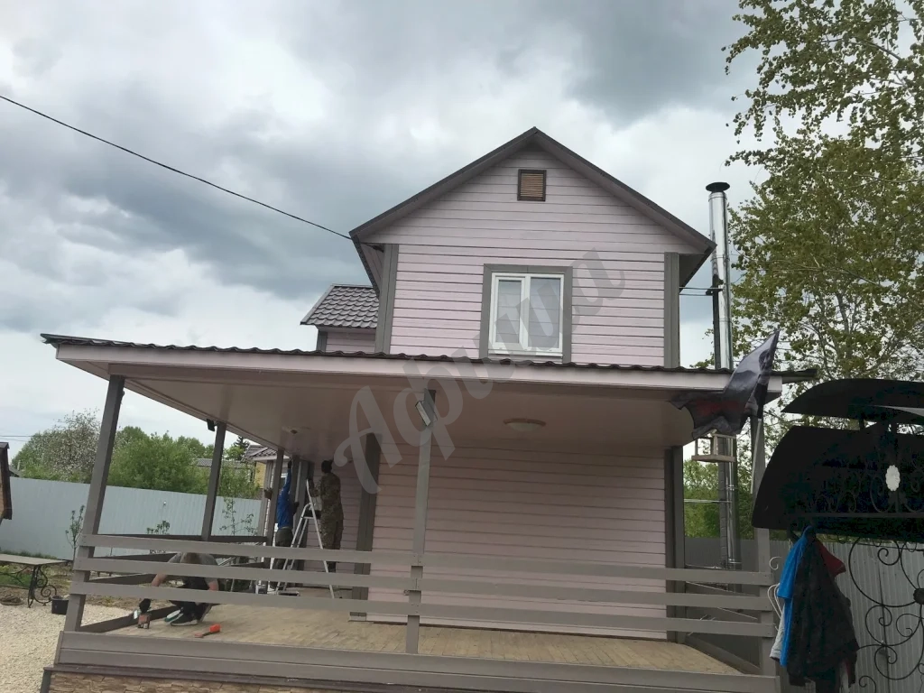 Покраска деревянного дома