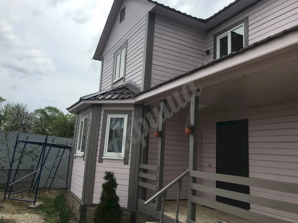 Покраска деревянного дома
