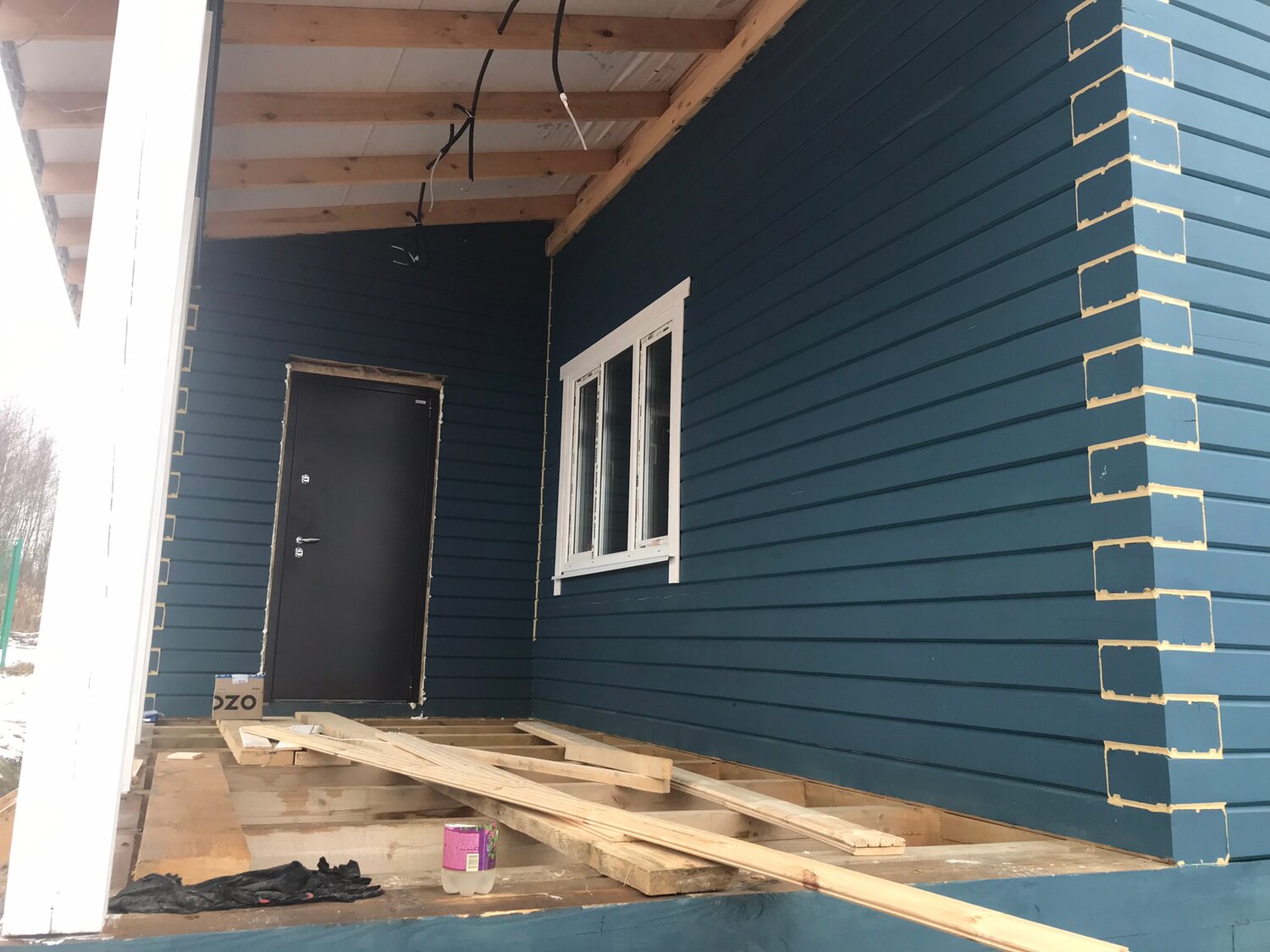 Покраска деревянного дома