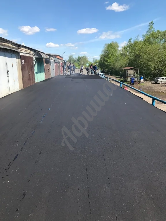 Устройство дорожного покрытия из мелкозернистого асфальтобетона