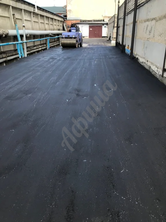 Устройство дорожного покрытия из мелкозернистого асфальтобетона
