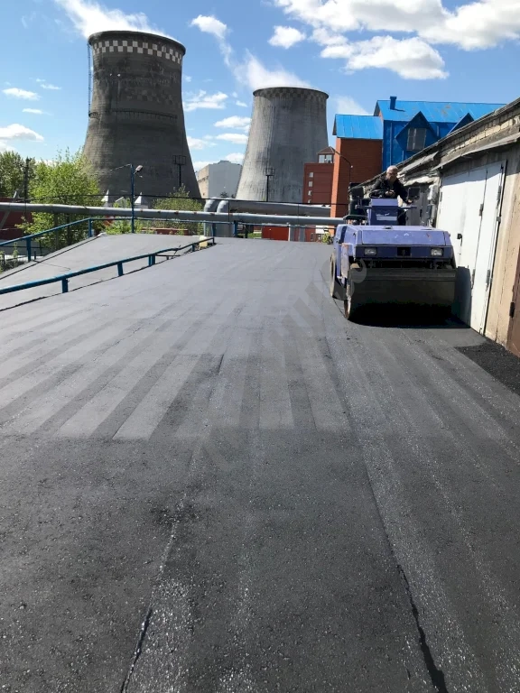 Устройство дорожного покрытия из мелкозернистого асфальтобетона