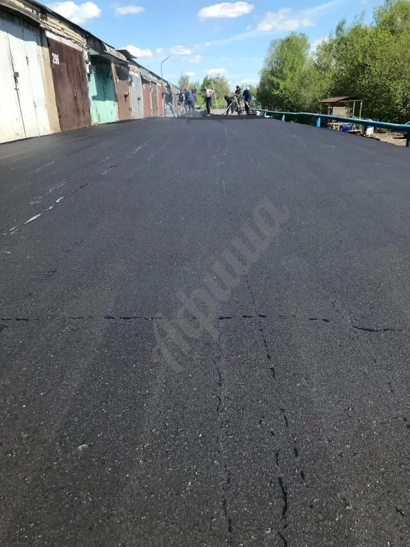 Устройство дорожного покрытия из мелкозернистого асфальтобетона