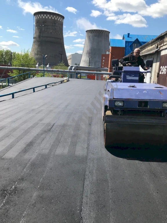 Устройство дорожного покрытия из мелкозернистого асфальтобетона