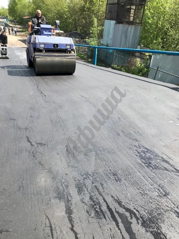 Устройство дорожного покрытия из мелкозернистого асфальтобетона