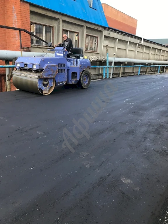 Устройство дорожного покрытия из мелкозернистого асфальтобетона