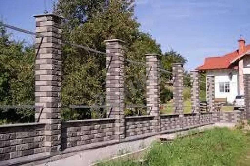 Строительство забора из бетонных блоков